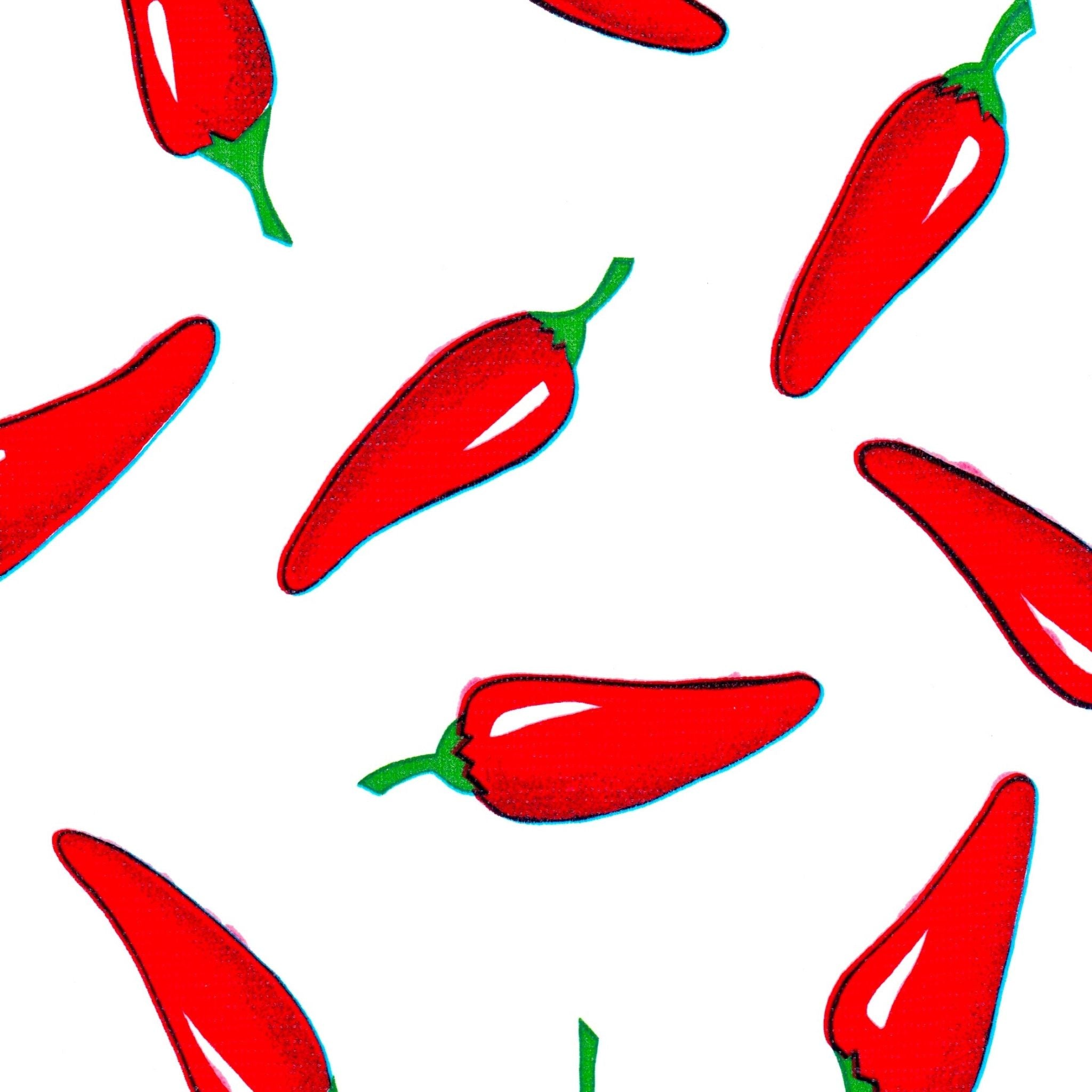 chili peppers on white oilcloth swatch