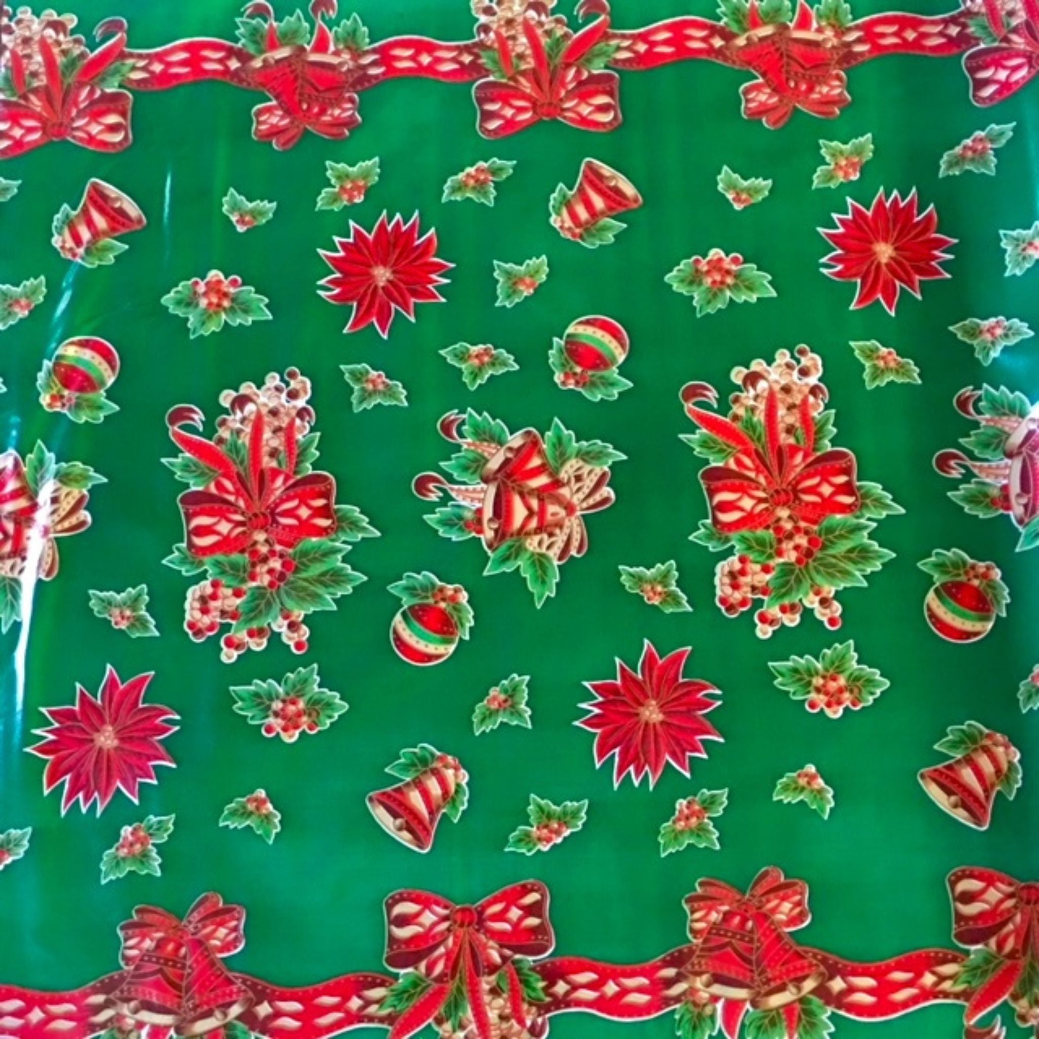 christmas bells and bows green oilcloth swatch