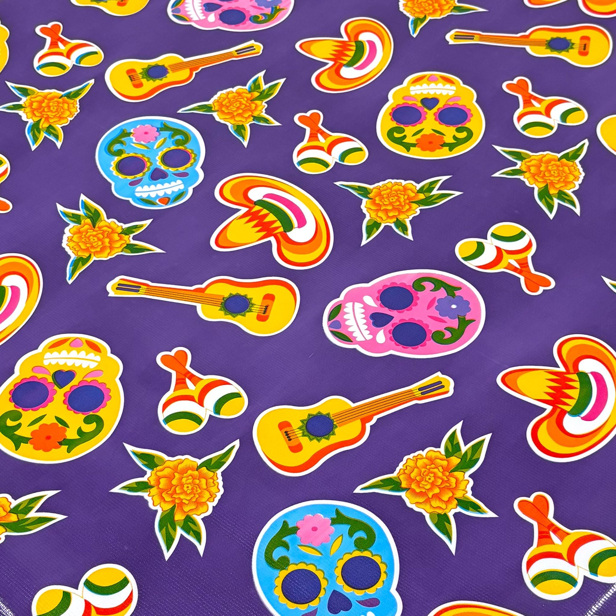 skulls on purple oilcloth swatch