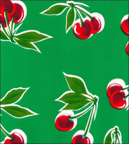 Cherries on Green oilcloth fabric swatch