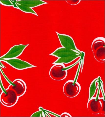 Cherries on red oilcloth fabric