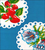 Doily 2 on Blue oilcloth fabric with fruit and flowers