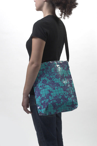 freckled sage day of the dead purple on light blue crossover bag