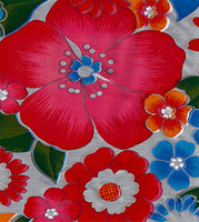 Oilcloth fabric swatch blue red pink orange flowers  some with leaves on solid silver background