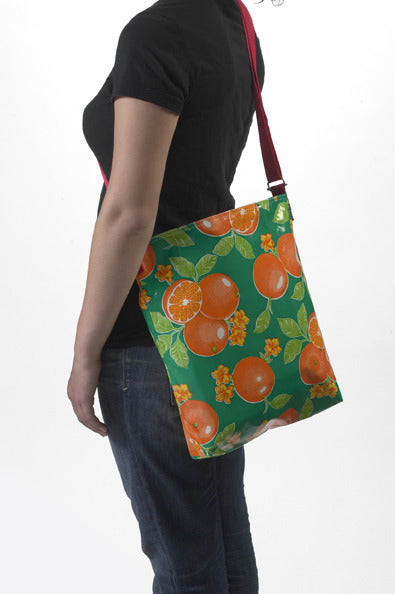 freckled sage oranges green crossover bag