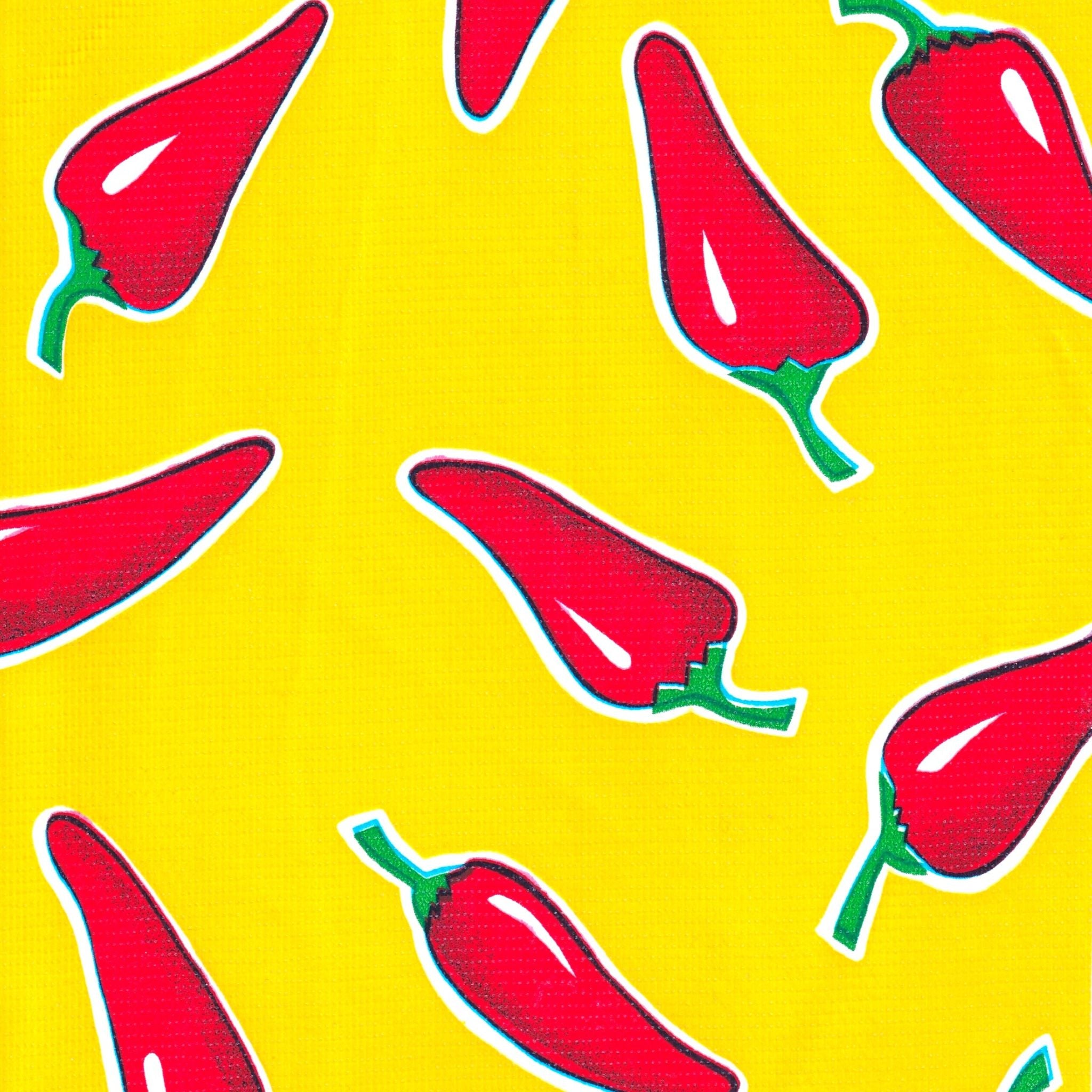 chili peppers on yellow oilcloth swatch