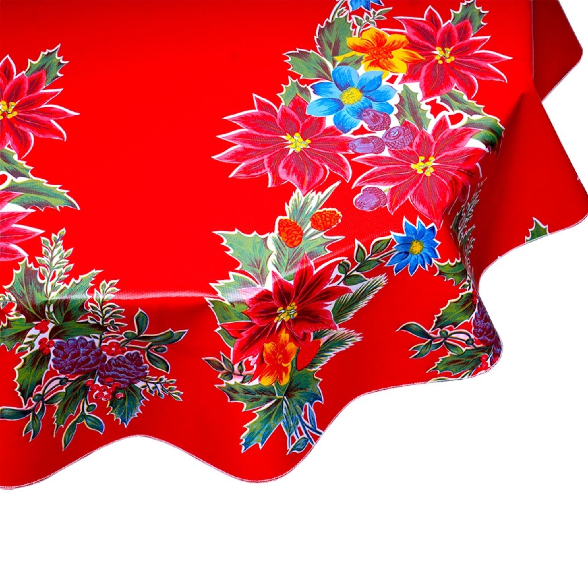 close up christmas poinsettia red round oilcloth tablecloth
