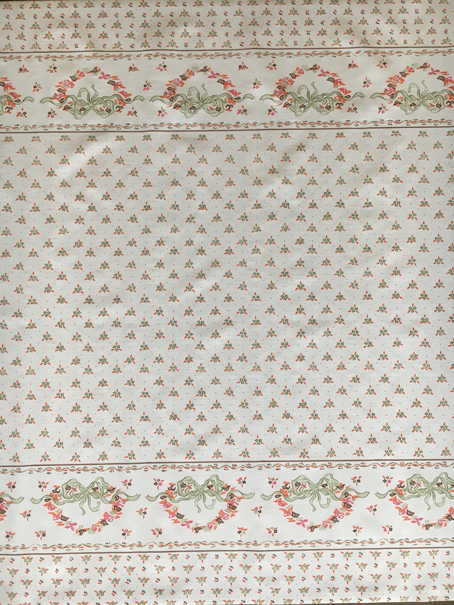 oilcloth by the yard ribbons and flowers gold on white swatch 1