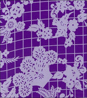 Day of the Dead White on Purple oilcloth with skeletons on bicycles and flowers