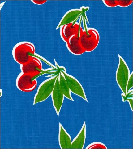 Cherries on Blue oilcloth fabric swatch