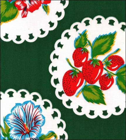 Doily 2 on Green oilcloth swatch with fruit and flowers on large doilies