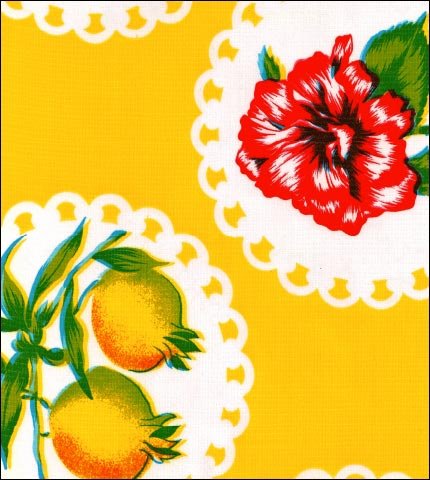 Doily 2 on Yellow oilcloth fabric with exotic fruits and flowers on large doilies