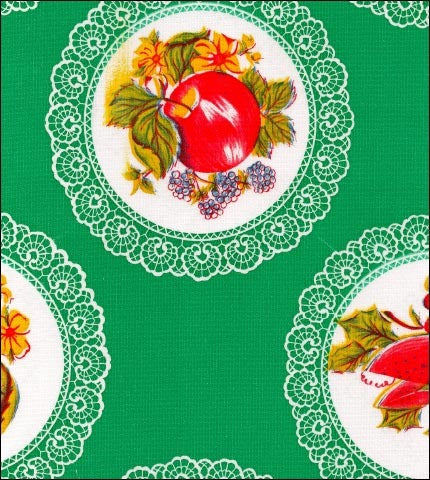 Doilies on Green oilcloth Fabric with fruits