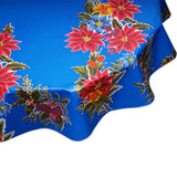 round tablecloth Christmas Poinsettias on Blue oilcloth