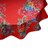 Round tablecloth in Christmas Poinsettias on Red oilcloth