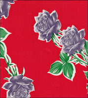 Oilcloth Fabric Swatch long stemmed Purple Roses on solid red background