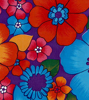 Oilcloth fabric swatch red pink yellow blue flowers on purple background